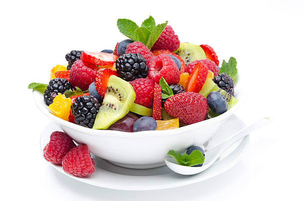 istock salad of fresh fruit and berries in a bowl isolated 178711455