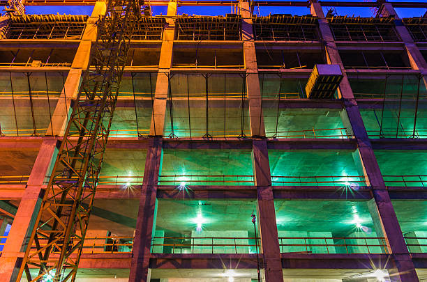 istock Nighttime construction with lights against a blue sky 178711477