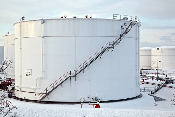 istock white tanks in tank farm with snow 178711938
