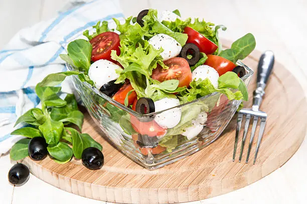 Bowl with fresh and healthy Tomato-Mozzarella Salad