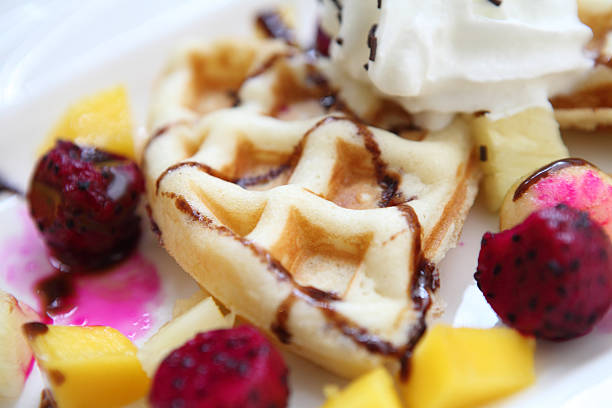 istock waffle with ice cream on wood background 178712518