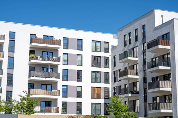 istock New white apartment building in front of a blue sky 1787130505
