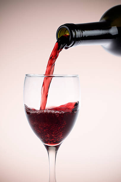 istock red wine glass and bottle 178713343