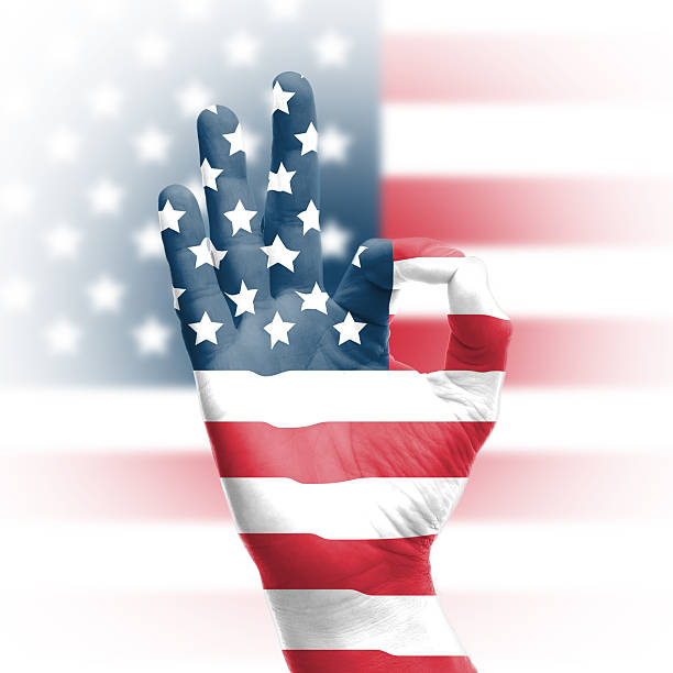istock hand OK sign with USA flag 178713453