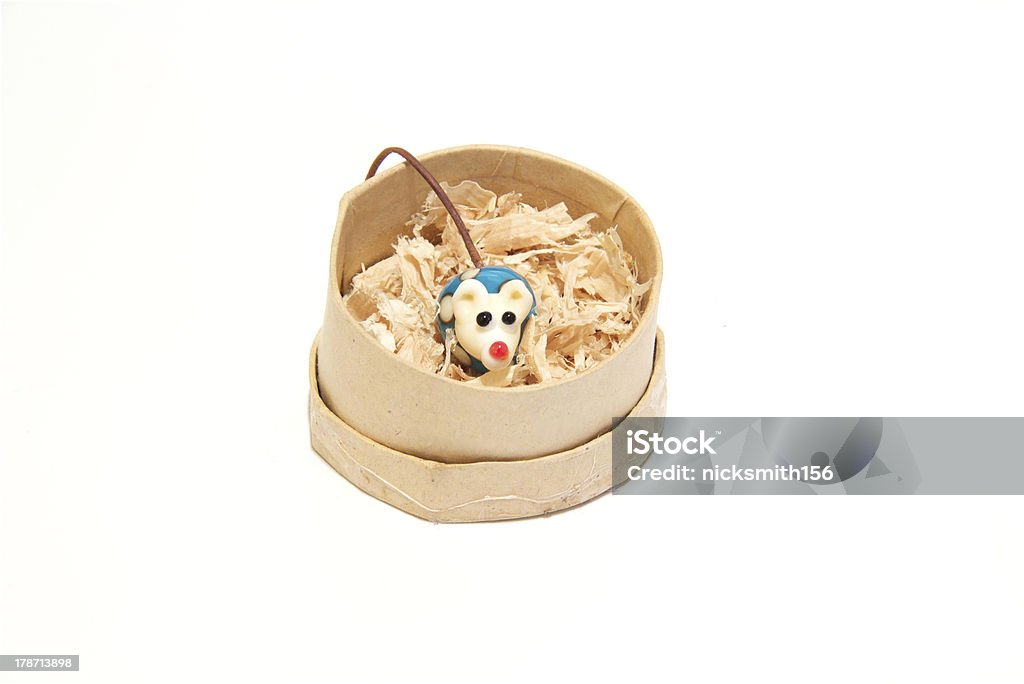 Toy china mouse in a round box toy china mouse in a round box with saw dust Animal Stock Photo