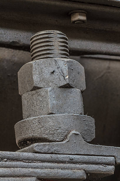 istock Old greasy screw nut / bolt close up view 178714039