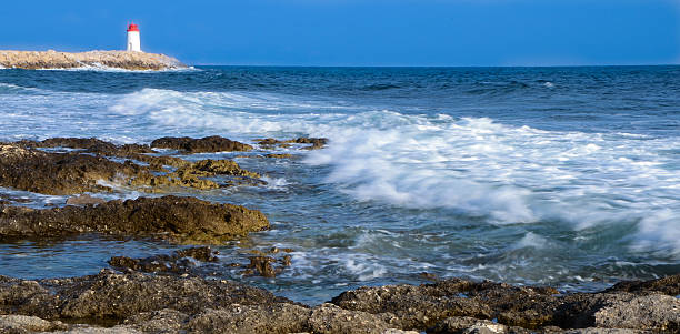 istock Landscape of ocean waves and lighthouse 178714217