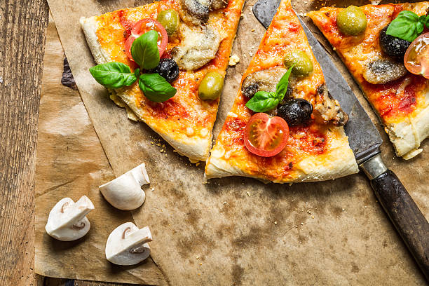 istock Closeup of pizza with mushrooms 178714600