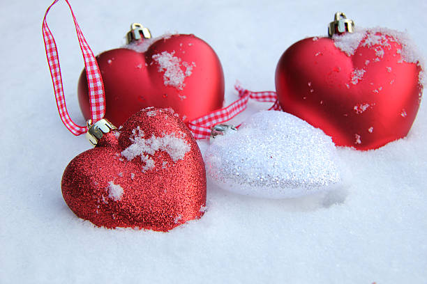 istock Red and white heart ornaments in snow 178714877