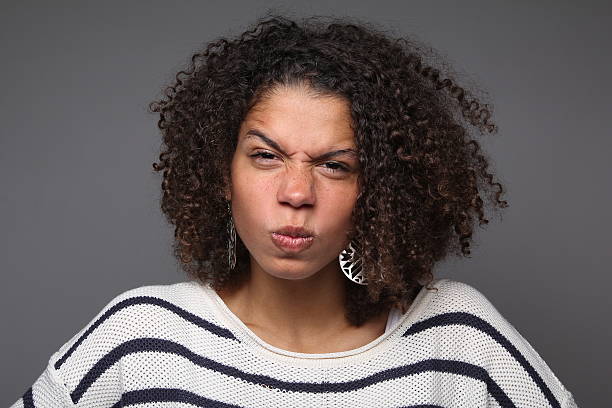 istock Beautiful woman with an afro looking angry 178715066