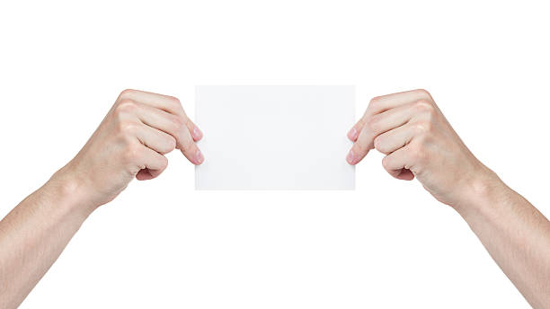 istock two adult man hands holding blank paper sheet 178715541