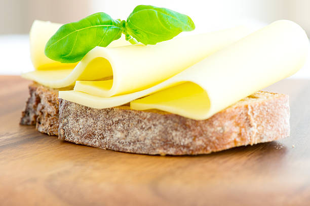 istock Sandwich with cheese tomatoes and basil close up 178715564
