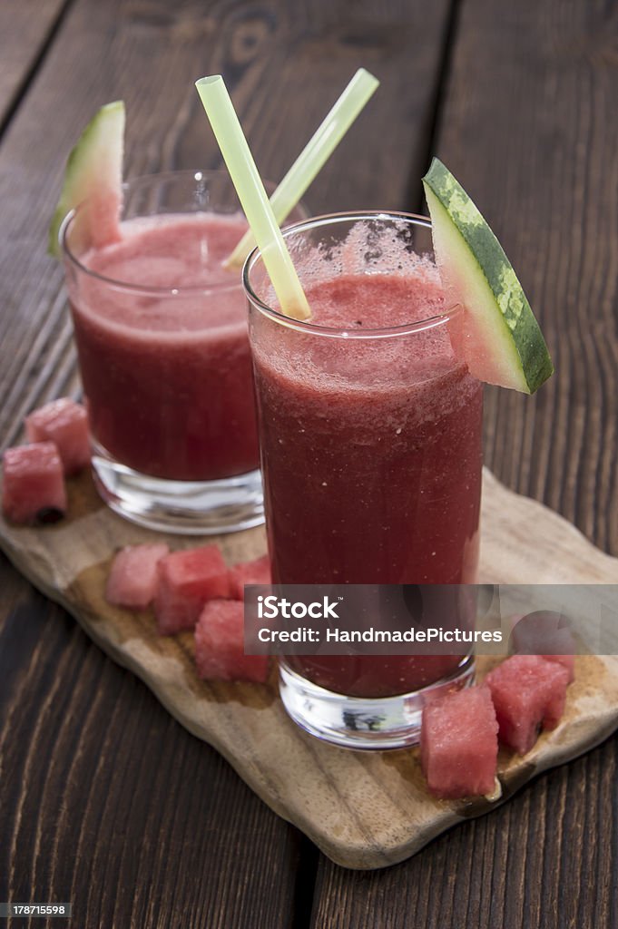 Fresh made Watermelon Juice Fresh made Watermelon Juice on wooden background Chopped Food Stock Photo