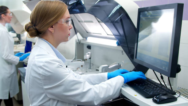 istock A medical worker works in a hospital laboratory using an automatic biochemical analyzer. Concept of new medical technologies and modern research. 1787161566