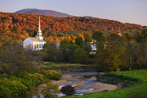 Fall foliage behind a rural Vermont church