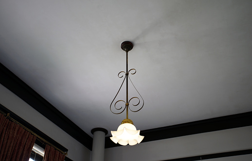 Light bulbs hanging from ceiling with Modern dining room