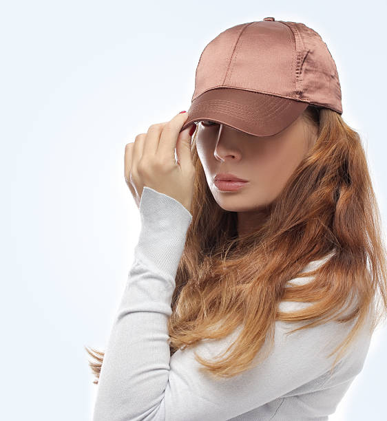 istock Gold haired girl with cap on blue background 178718140