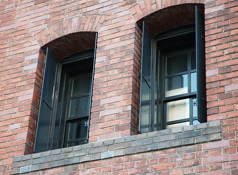 Old retro brick wall building windows