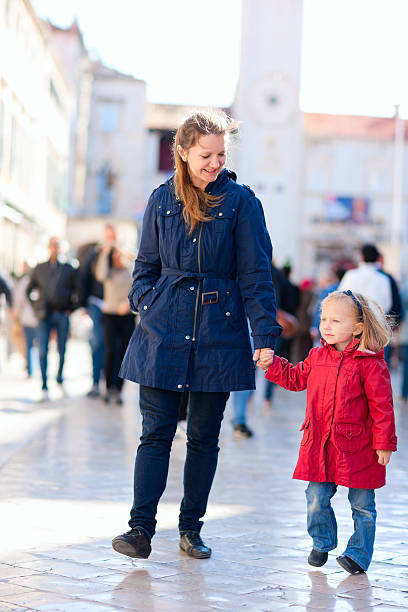 istock Mother and daughter in city 178718445