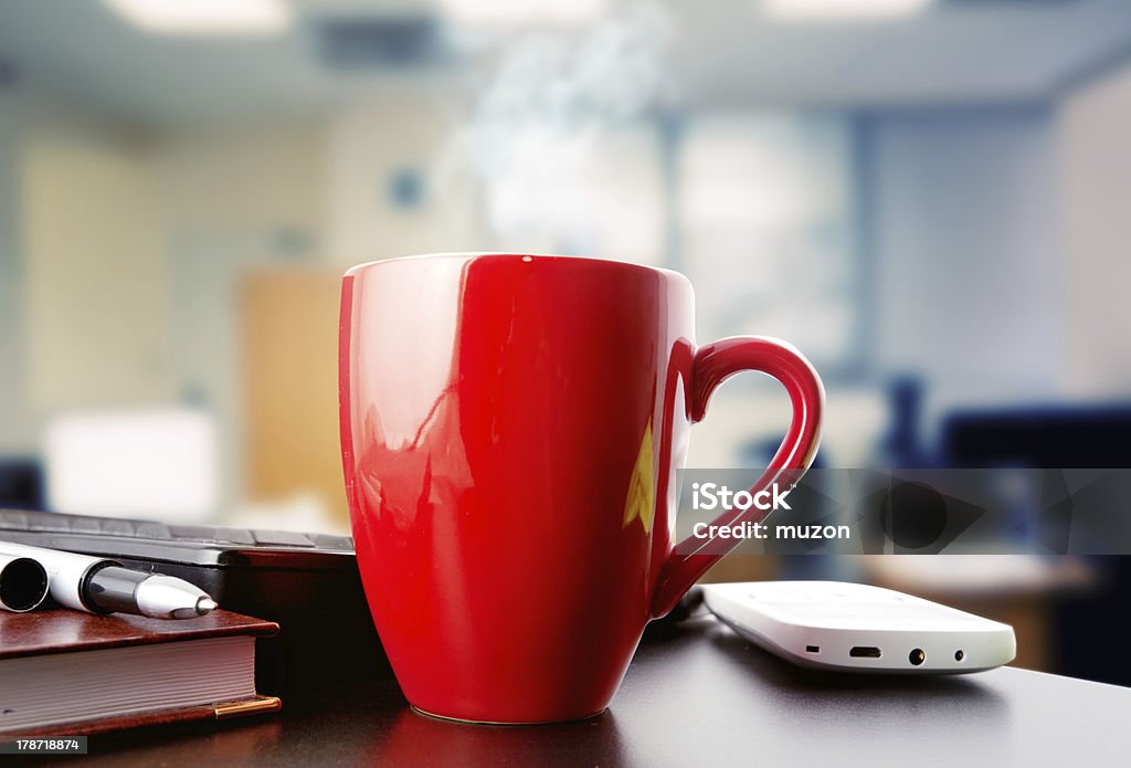 coffee on a table in office coffee on a black table showing break or breakfast in office Mug Stock Photo