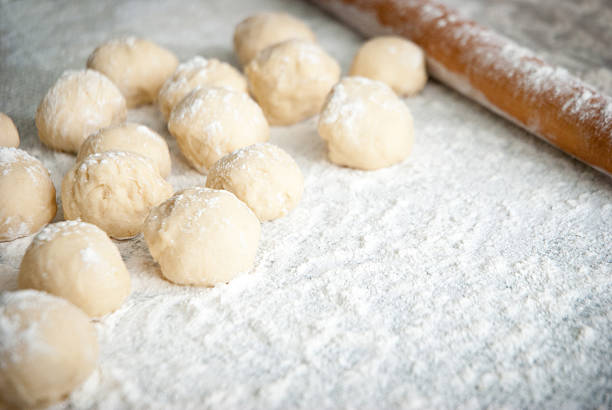 istock Prepared dough in ball shape on silver tray 178720252