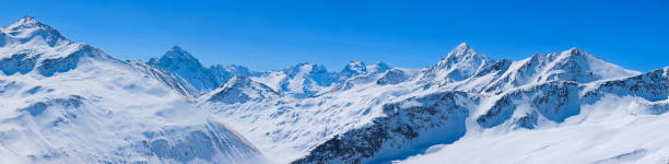 Back country skiing. Perfect off piste ski slope. High mountain landscape At the top. Italian Alps ski area. Ski resort Livigno. italy, Europe. Perfect ski slope. Back country skiing. High mountain landscape At the top. Italian Alps ski area. Panoramic Ski resort Livigno. italy, Europe. Ski opening. top of ski mountain stock pictures, royalty-free photos & images