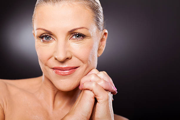 istock mid age woman close up portrait 178720507