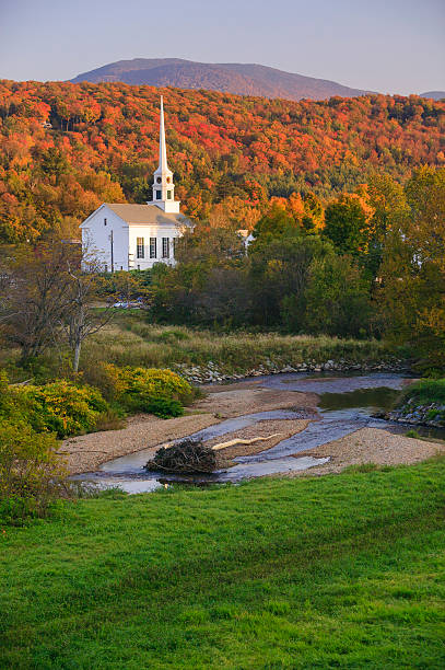 istock Fall foliage behind a rural Vermont church 178721002