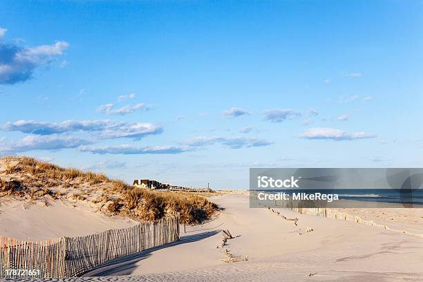 Beach Fence Sand Houses And The Ocean Stock Photo - Download Image Now - The Hamptons, Beach, Long Island