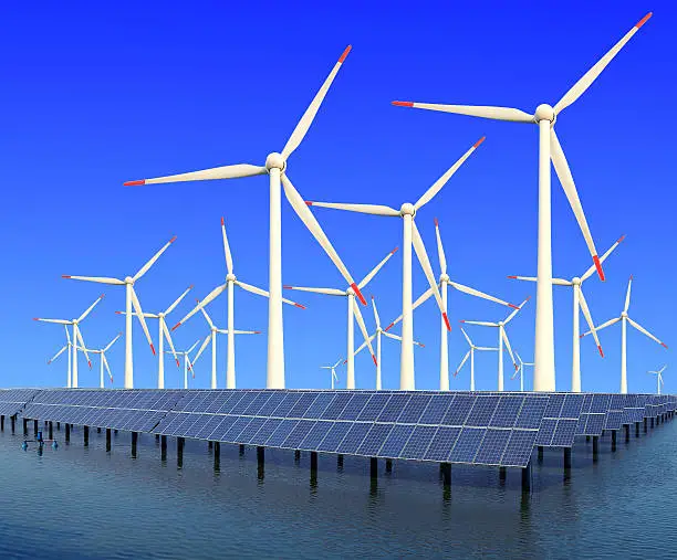Photo of solar energy panels and wind turbine