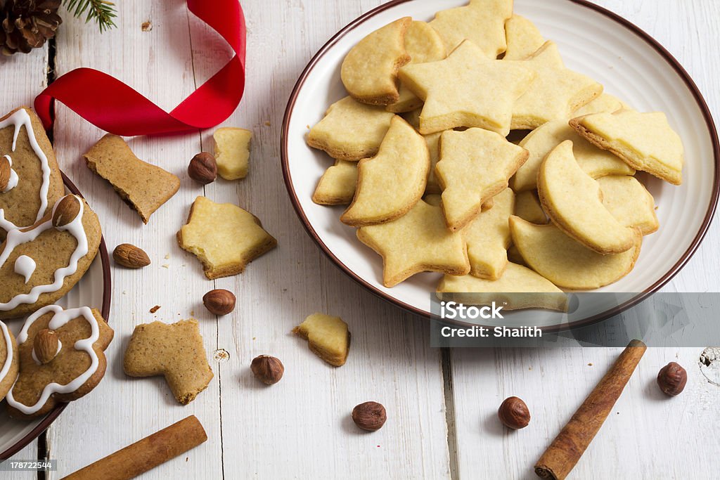 Snacking Christmas cookies on a plate Snacking Christmas cookies on a plate. Baked Stock Photo