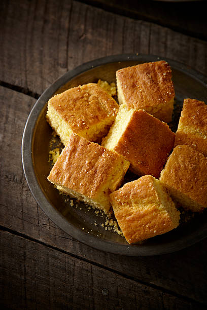 istock Squares of cornbread in a wooden bowl 178723290
