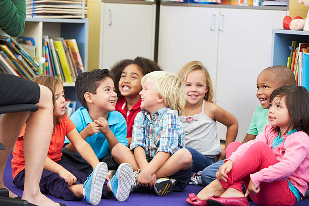 istock Group of Elementary Pupils In Classroom Listening To Teacher 178723343