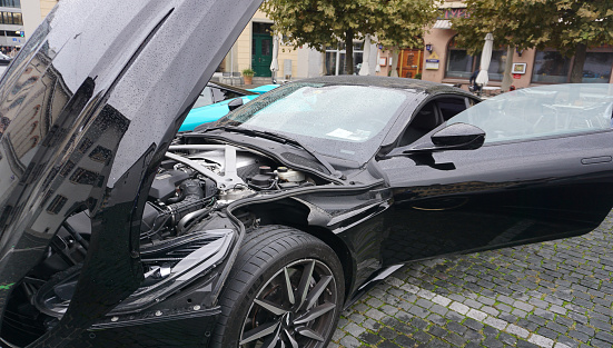 Winterthur, Switzerland - October 21, 2023: Aston Martin in the dark. British supercar at Winterthur, Switzerland