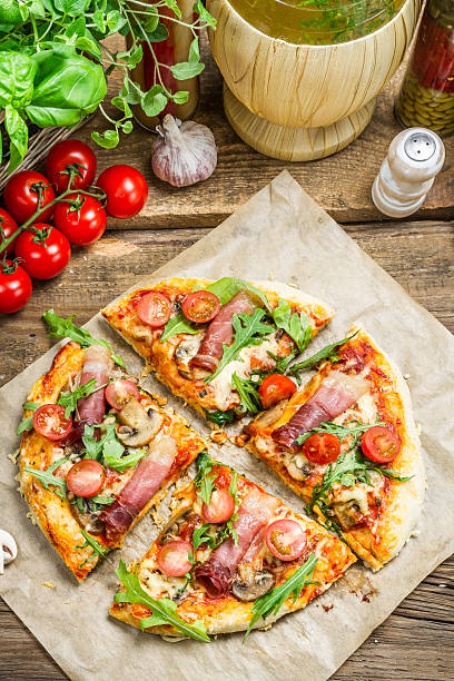 istock Baked pizza with fresh vegetables 178725843