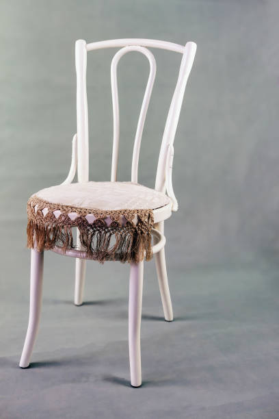 istock Antique white chair on a gray background 1787273032