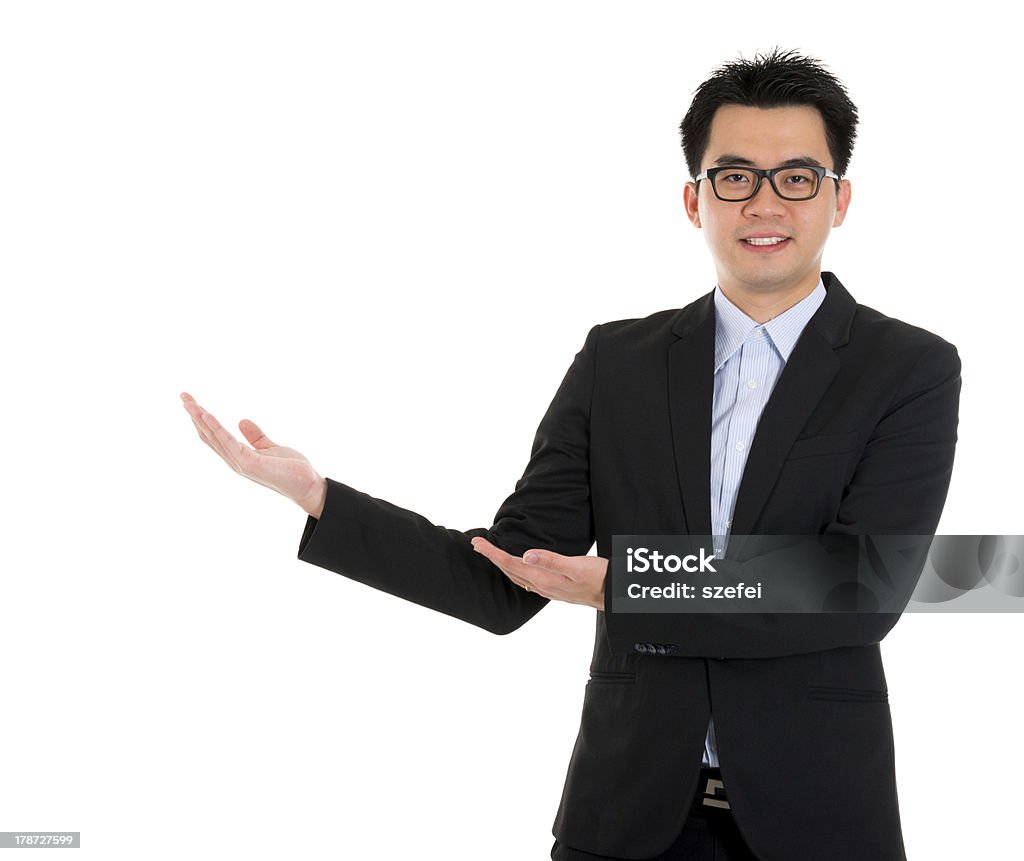 Asiatique Homme d'affaires main montre espace vide - Photo de Adulte libre de droits