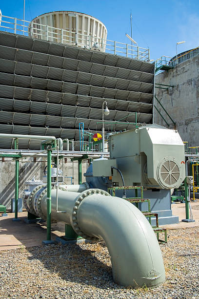 Pipe and Cooling Tower stock photo