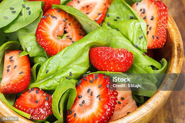 Strawberry Spinach Salad Stock Photo - Download Image Now - Black Color, Bowl, Color Image