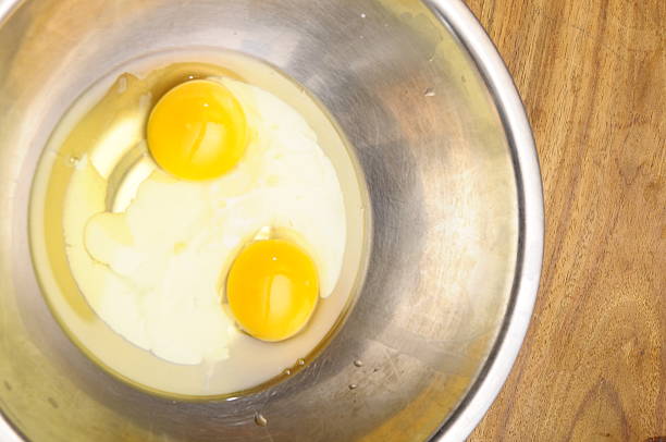 istock Egg yolk and cream in metallic bowl 178729935