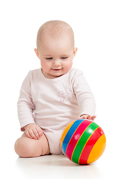 istock baby girl playing ball 178730269