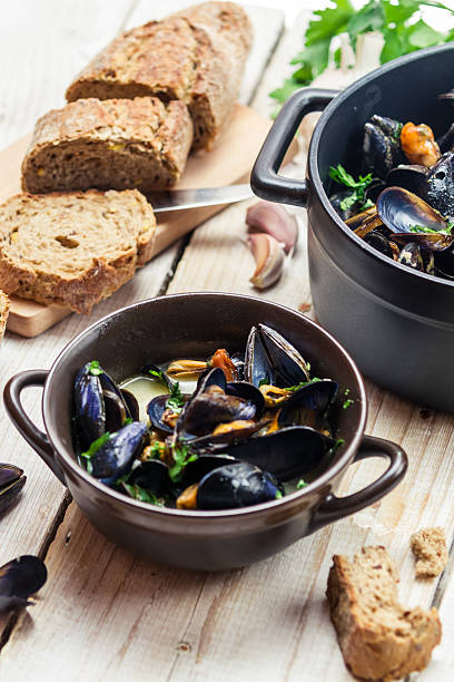 istock Freshly cooked mussels at home and served with bread 178730769