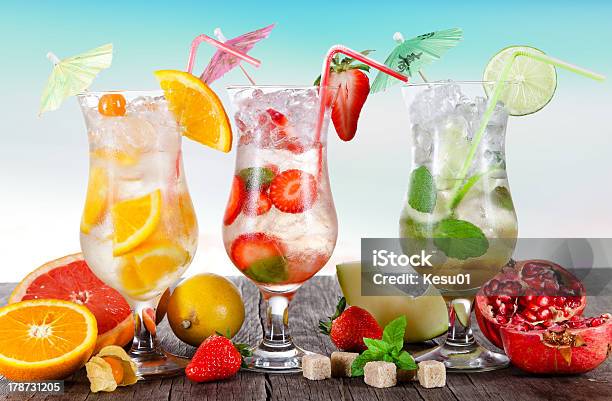 Summer Drinks On The Beach Stock Photo - Download Image Now - Alcohol - Drink, Alcohol Abuse, Animal Shell