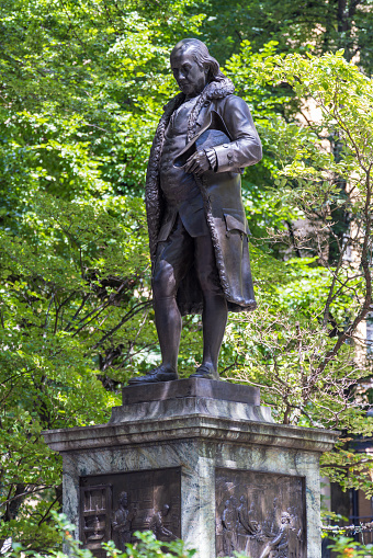 Boston, Massachusetts, United States - August 9, 2023: Benjamin Franklin statue, Old City Hall. The bronze sculpture was modeled by Richard Saltonstall Greenough in 1855, and dedicated on September 17, 1856.