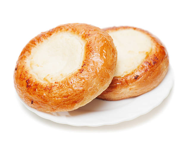 istock Fresh buns muffins with cottage cheese on white background. 178733054