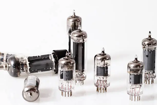 Glass vacuum radio tubes.  Isolated image on white background