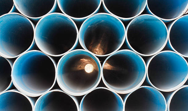 istock PVC pipes stacked in construction site 178733550