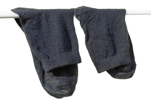 the sock is torn at the thumb, looks funny. isolated on white background