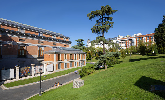 Madrid, Spain, October 6, 2023: View of the Museo del Prado (left) on a sunny autumn day.