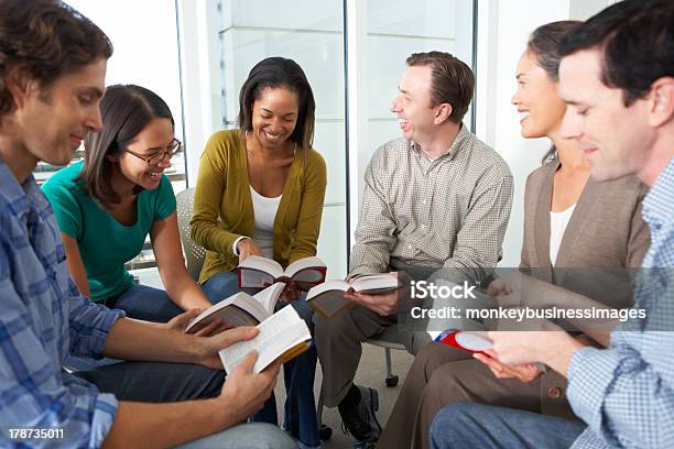 Bible Group Reading Together In A Close Circle Stock Photo - Download Image Now - Bible, Studying, Group Of People